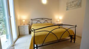 Postel nebo postele na pokoji v ubytování VILLETTA LA ZANCA + 34 fotografií