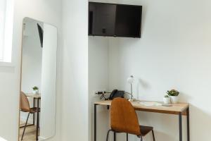 TV a/nebo společenská místnost v ubytování HOTEL ORDIZIA