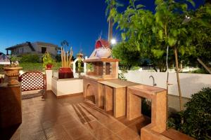 A garden outside Margarita luxury apartment 1