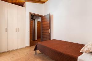 Postel nebo postele na pokoji v ubytování Nicolas Beach House