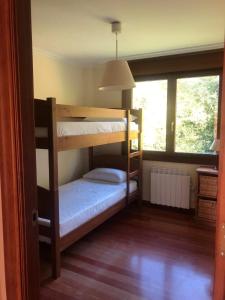 Giường trong phòng chung tại Arroes Village And Pool - Villa con piscina privada - VV-1708-AS +33 ảnh