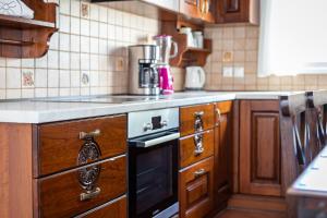 Kuchyň nebo kuchyňský kout v ubytování Nicolas Beach House