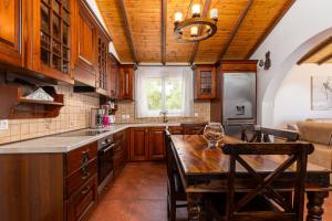 Kuchyň nebo kuchyňský kout v ubytování Nicolas Beach House