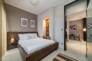 Posteľ alebo postele v izbe v ubytovaní ORANGEHOMES 130 m2 APT with fantastic view to river Danube