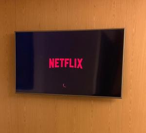 TV a/nebo společenská místnost v ubytování Hotel Amália