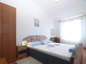 Posteľ alebo postele v izbe v ubytovaní Apartments Tomislav 2078