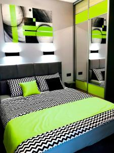 Posteľ alebo postele v izbe v ubytovaní APARTAMENT ELEGANCE GREEN w Nautica Resort