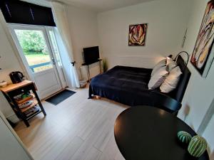 Afbeelding uit fotogalerij van Provstegården Bed & Breakfast in Hovedgård