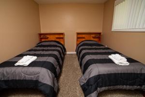 Cama ou camas em um quarto em Private Waterville Estates 4 Bedroom Vacation Home In The White Mountains Of Nh - Tr51e