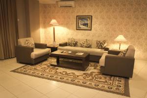 Posezení v ubytování Travellers Suites Serviced Apartments