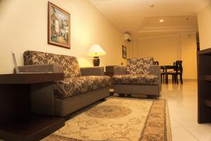Posezení v ubytování Travellers Suites Serviced Apartments