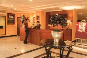 Hosté ubytování Travellers Suites Serviced Apartments