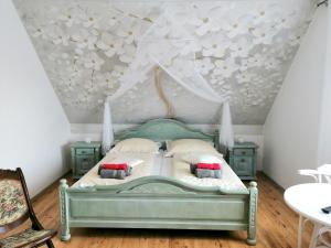 Ένα ή περισσότερα κρεβάτια σε δωμάτιο στο Pension Nordseebriese