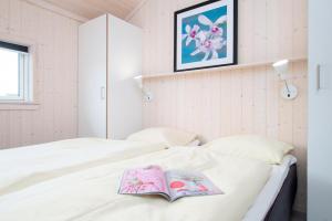 Postel nebo postele na pokoji v ubytování Resort 2 Beach House B 50