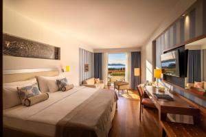 Кровать или кровати в номере President Hotel, Valamar Collection