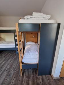 Postel nebo postele na pokoji v ubytování Hostel by Hyve Basel
