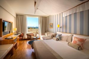 Телевизор и/или развлекательный центр в President Hotel, Valamar Collection