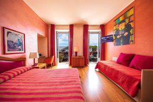 Postel nebo postele na pokoji v ubytování Intra Hotel