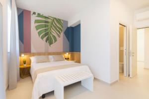 Una cama o camas en una habitación de Hotel Bellavista - Boutique Hotel 80 fotos más