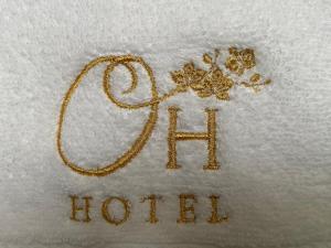 Sertifikat, nagrada, logo ili drugi dokument prikazan u objektu Hotel Orquídea