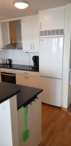 Kuchyň nebo kuchyňský kout v ubytování Snäck Apartment floor 11 sea view