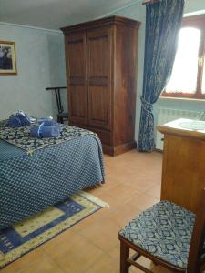 Postel nebo postele na pokoji v ubytování B&B Il Cantico