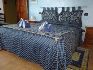 Postel nebo postele na pokoji v ubytování B&B Il Cantico