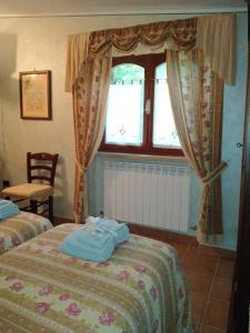 A bed or beds in a room at B&B Il Cantico