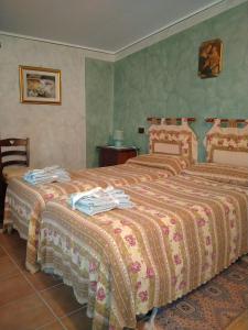 A bed or beds in a room at B&B Il Cantico