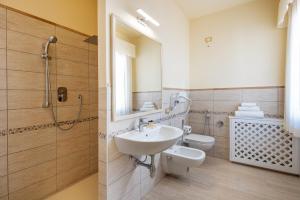 Koupelna v ubytování Hotel Regina Elena