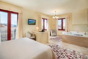 Postel nebo postele na pokoji v ubytování Hotel Regina Elena