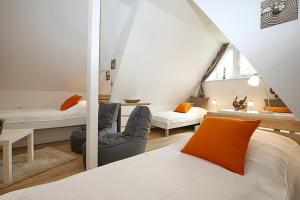 Кровать или кровати в номере Reethaus Am Mariannenweg 08b