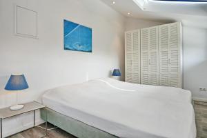 Postel nebo postele na pokoji v ubytování Apartmenthaus Bull Wohnung 6