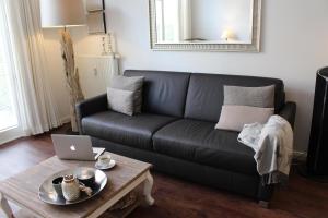 Posezení v ubytování Meeresblick Wohnung 018