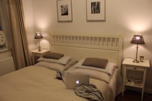 Postel nebo postele na pokoji v ubytování Meeresblick Wohnung 018