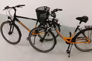 two bikes are parked next to each other at Linden-Palais Wohnung 12 in Heiligendamm