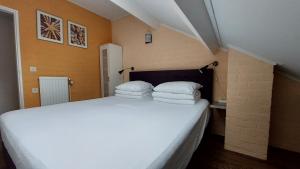 Postel nebo postele na pokoji v ubytování Vakantiehuis Ruby
