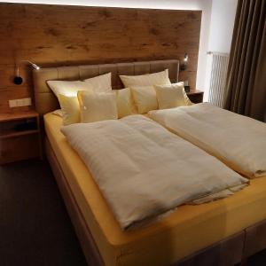 Postel nebo postele na pokoji v ubytování Waldgasthof Lorchenmühle UG