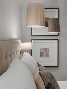 Voodi või voodid majutusasutuse Boutique Hotel Wellenberg toas