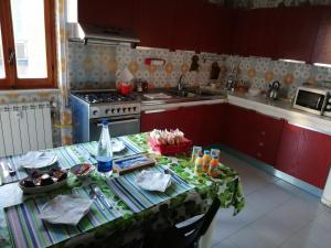 Kuchyň nebo kuchyňský kout v ubytování B&B Vanvitelli