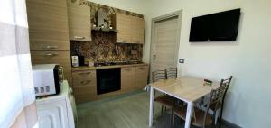 Kuchyňa alebo kuchynka v ubytovaní Casa Gio - Appartamenti Vacanze + 30 fotografií