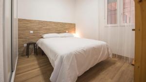 Postel nebo postele na pokoji v ubytování San José con parking incluido - Apartamentos Aloha Toledo