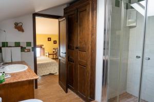 a bathroom with a sink and a shower and a toilet at Il Castello di San Sergio in Centola +48 photos