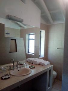 Postel nebo postele na pokoji v ubytování Hotel Samanapaq