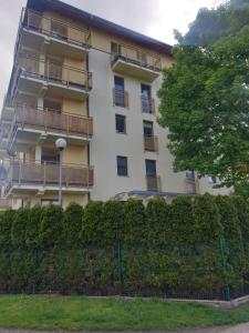 Budova, v ktorej sa apartmán nachádza + 1 fotografia