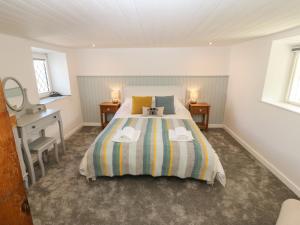 Katil atau katil-katil dalam bilik di 3 Cae'r llwyn Cottages