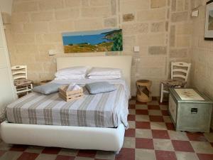 Postel nebo postele na pokoji v ubytování La `Ssuta