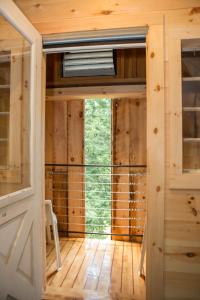 an inside view of a tiny house with a window at Riverhouse in South Berwick