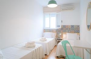 Postel nebo postele na pokoji v ubytování Hostal La Calzada