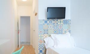 Postel nebo postele na pokoji v ubytování Hostal La Calzada